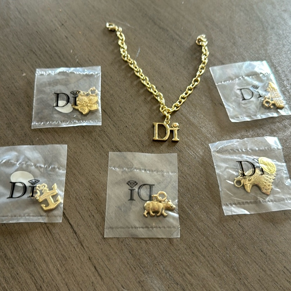 Gold chain and charms from diamonds international